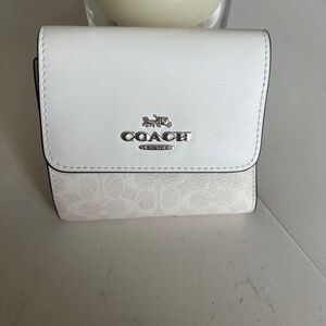 Coach wallet brand new and never used  in glacier white color
